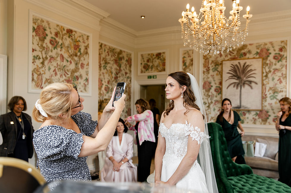 Makeup artist captured a photograph after the bridal prep in the dressing room of a bride ready to walk down the aisle.