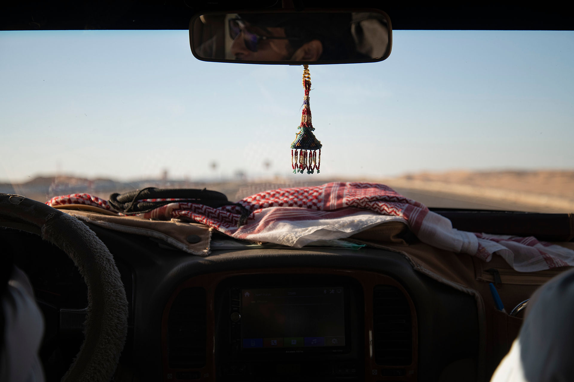 view through the window of a car driving in the desert at a  Systemic Naturetherapy Retreat in the Desert in Egypt, El Gouna