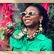 Henna on hand girl holding snake