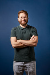 Professional man posing naturally during a personal branding photoshoot