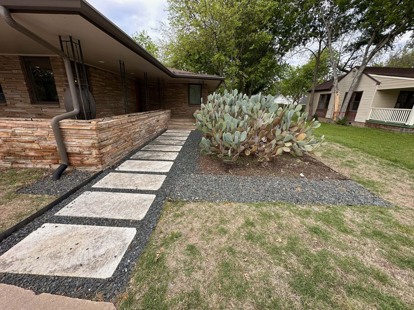 Existing paver pathway with unsightly edging and potential for a better cactus bed.
