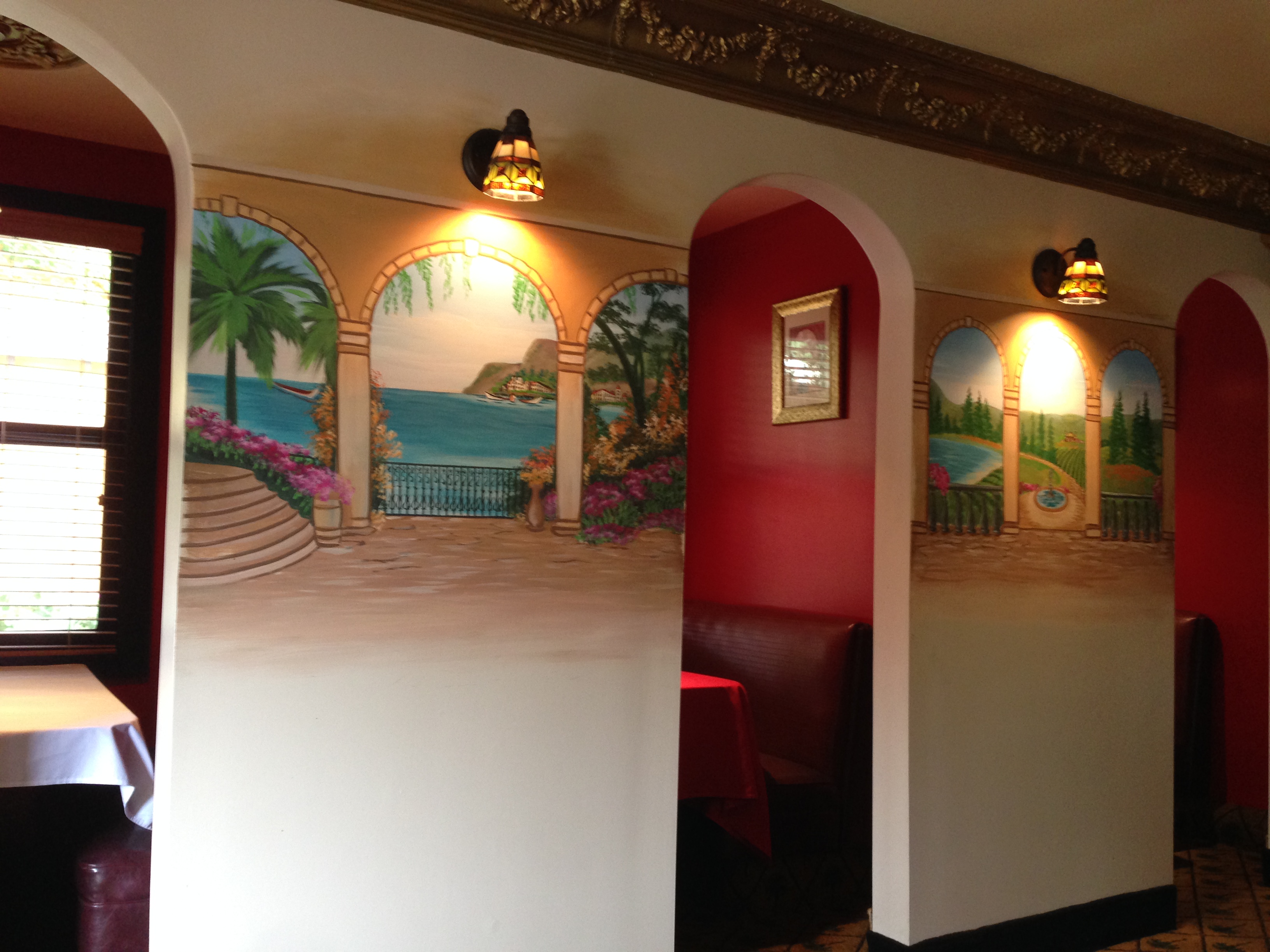 A bustling Jalisco restaurant with a vibrant atmosphere, natural lighting, and a large stone patio