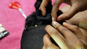 Closure pinned to wig cap