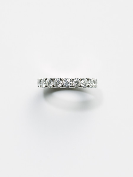 Top view close-up of handcrafted 18k white gold eternity ring pavé-set with 3.75ct F/VVS diamonds