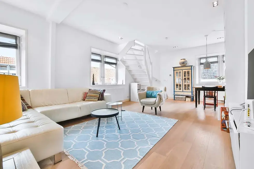 A clean and bright living room in a Burlington home after a deep cleaning service
