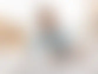 A baby crawling on a clean floor where baby safe cleaning products were used