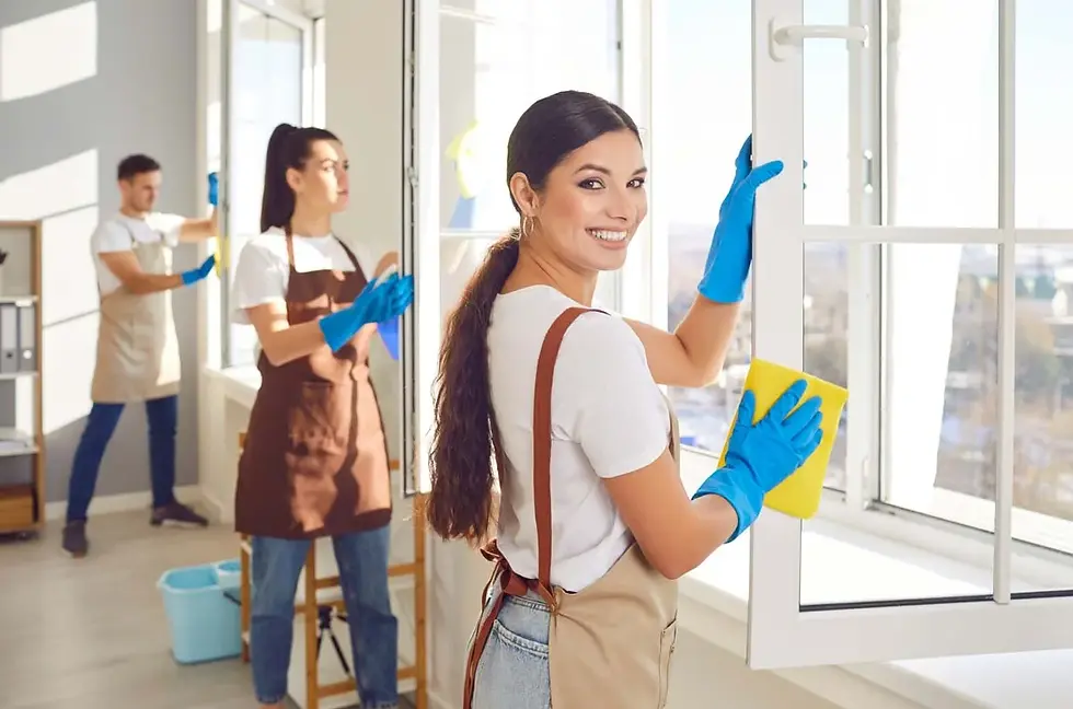 Professional house cleaners providing expert residential cleaning services in a tidy home