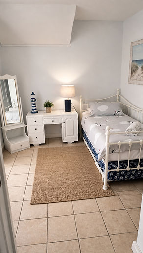 19_Orca_View_a_bright_tidy_minimalist_bedroom_photographed_fro_2048px.jpg