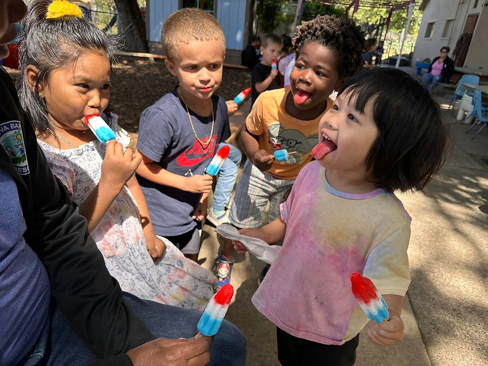preschool children eating popsicles