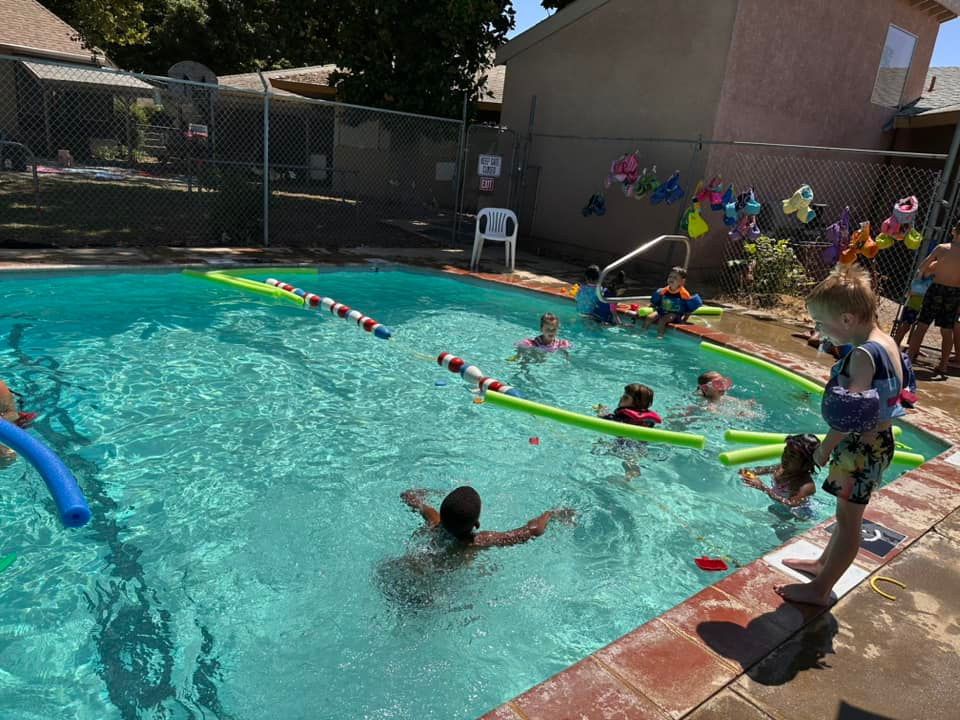 preschool children playing at the pool