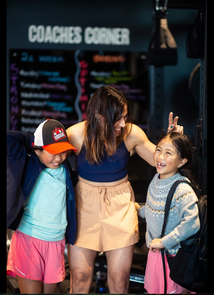 “Kids boxing camp at Rumble West 85th — children ages 7–14 practicing safe boxing drills and team games in a fun, energetic studio environment.”