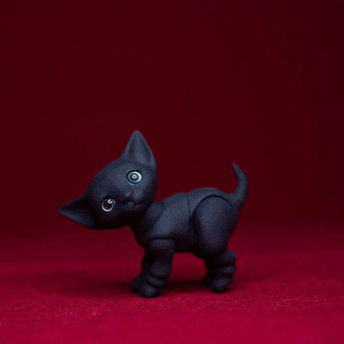 Thumbnail: Articulated black kitten doll