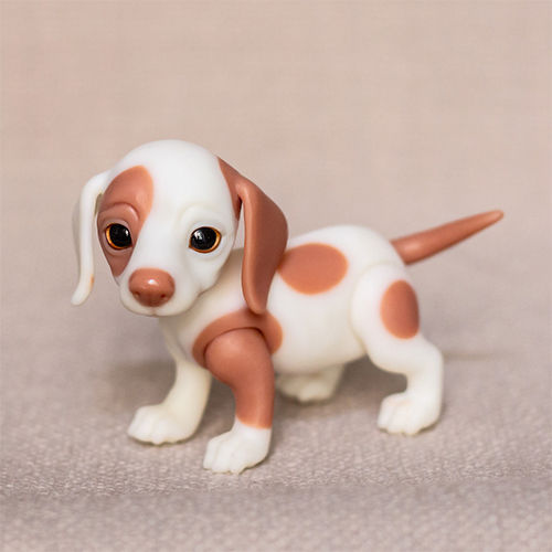Brown spotted puppy resin doll playing pose