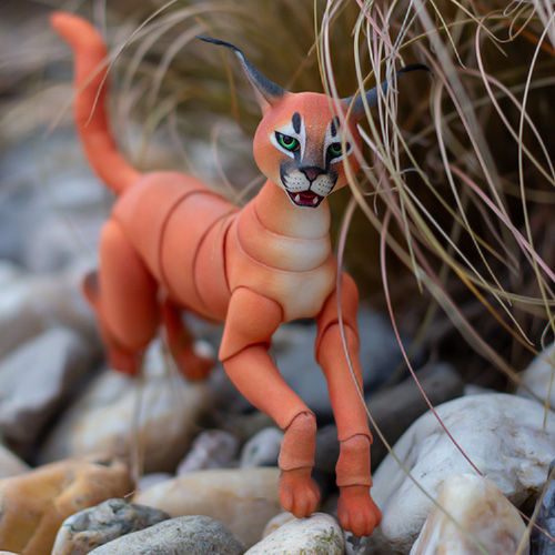 Thumbnail: Highly poseable BJD cat doll in the wild