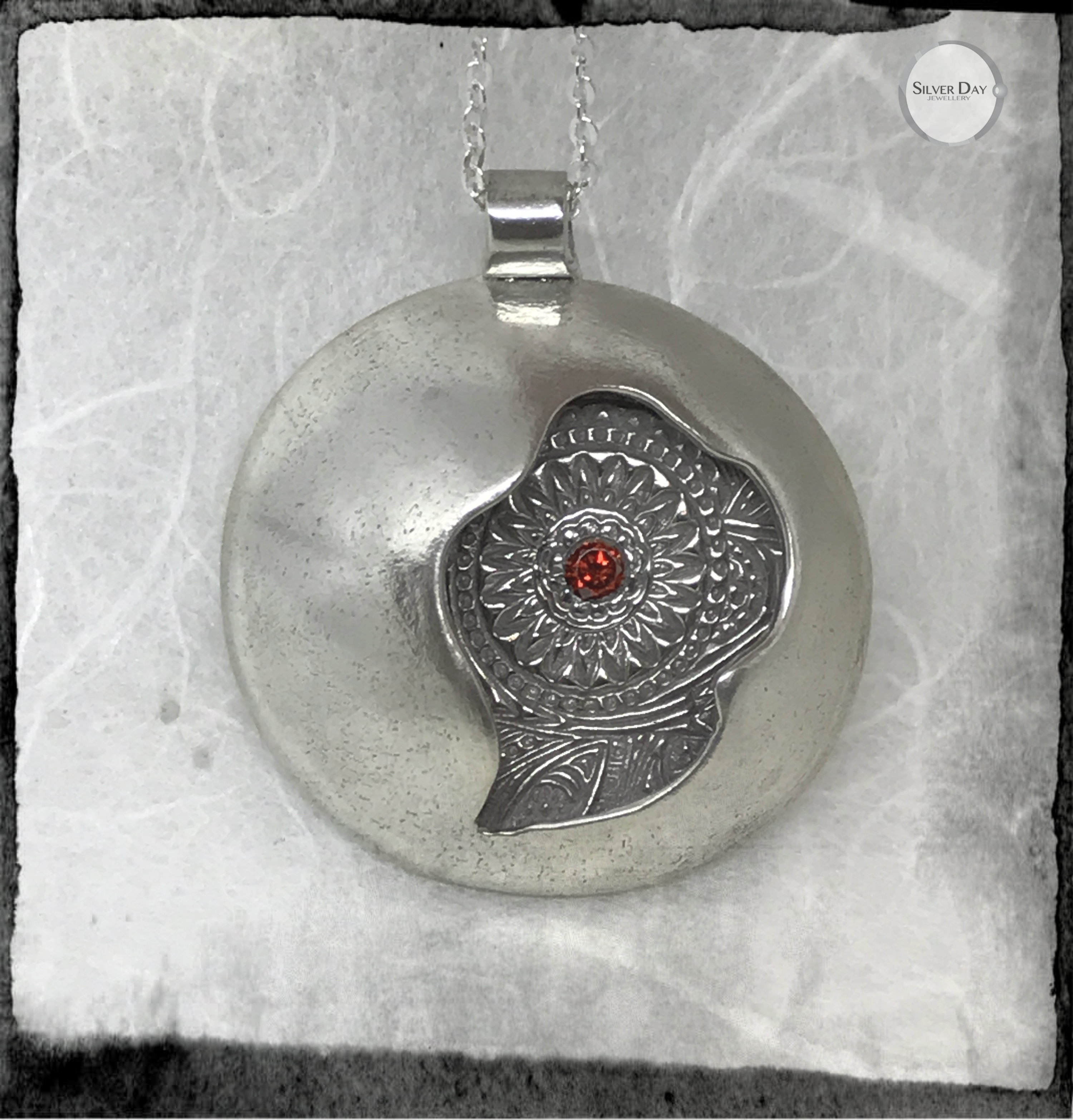 Sterling silver lentil bead pendant