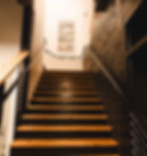 set of interior stairs leading up the The Door Shop offices