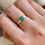 Thumbnail: Natural emerald ring with side CZ stones by Rhaya Jewels