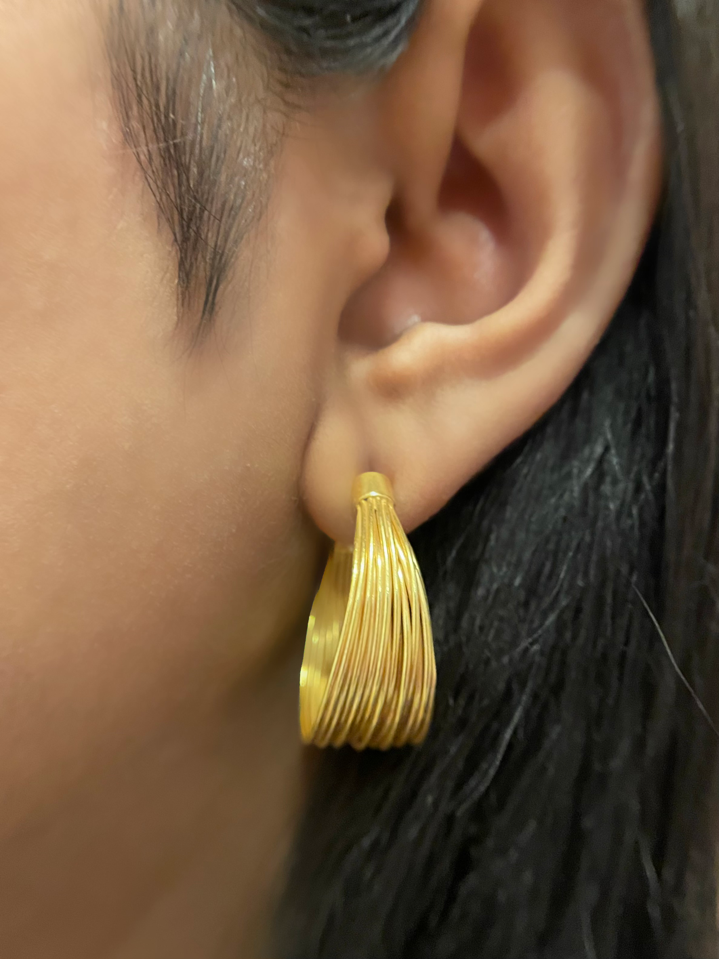 Bold yet minimal, our Multiple Wire Hoops feature layered sterling silver loops for a sculptural statement. Lightweight and v