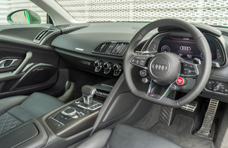 Interior dashboard shot of a Green Audi R8
