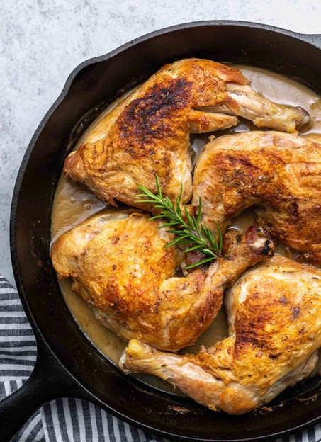 Roasted chicken legs in creamy gravy