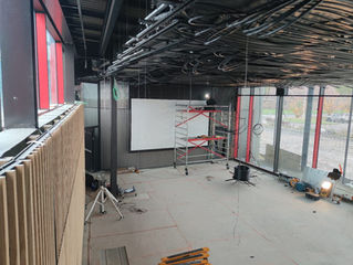 Installation of two motorised Widevision roll-up screens in Beauvechain