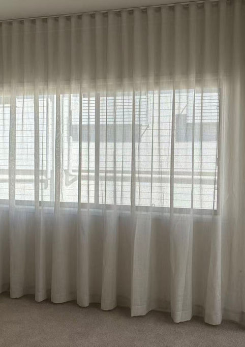 Sheer curtain in bedroom