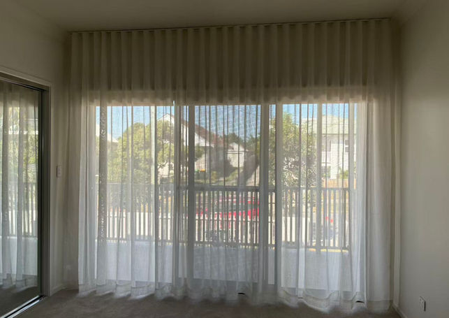 Sheer curtain in bedroom