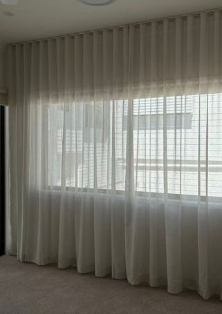 Sheer curtain in bedroom