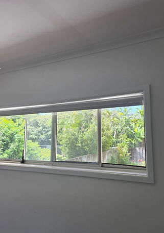 Roller blind in bedroom