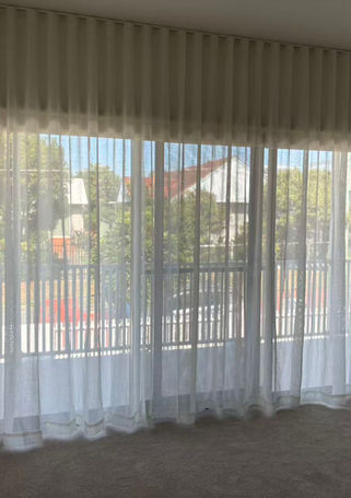 Sheer curtain in bedroom