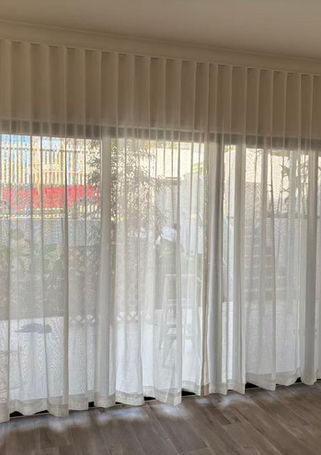 Sheer curtain in bedroom