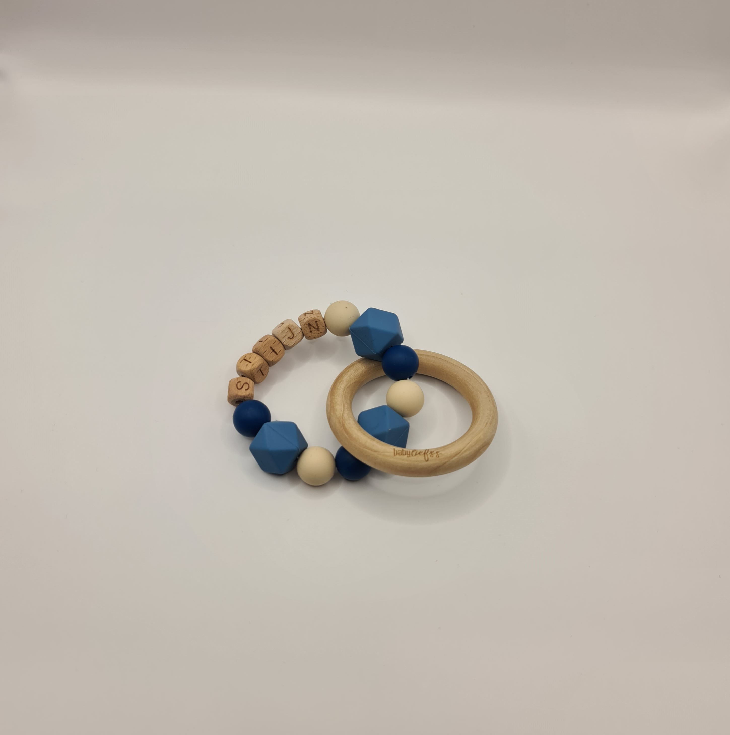Bijtring met naam - (Konings)Blauw Beige
