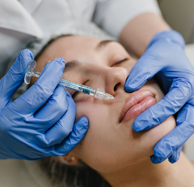 closeup-portrait-young-woman-doing-botox-procedures-by-professional-injection-making-lips-
