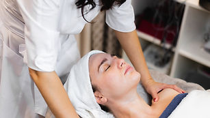 beautician-spa-beauty-salon-applies-cream-client-s-face-girl-lies-cosmetology-table (2).jp