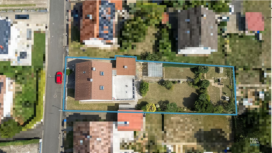 Luftbild des Grundstücks mit markierter Grundstücksfläche in Geldersheim