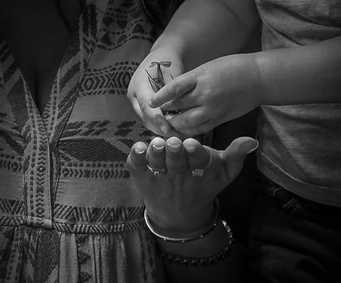 Black and white mother and son Portrait photographed by the lifestyle photographer Untamed Spirit Imagery