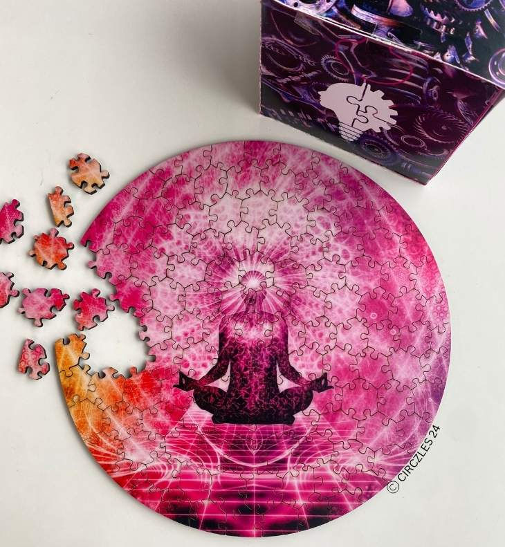 Mental Fatigue Recovery through mindful puzzle-solving, featuring a partially completed pink CircZles wooden puzzle with a meditating figure, promoting focus, relaxation, and screen-free engagement.