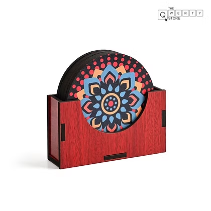 Wooden mandala coaster holder from The QWERTY Store—pretty, practical, and made to upgrade your table setup.
