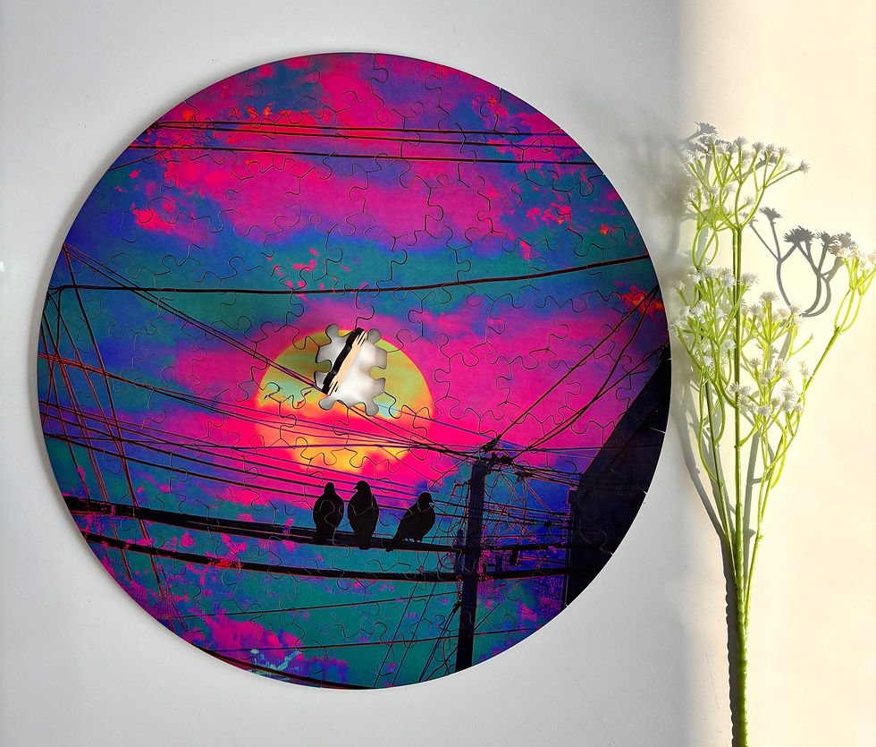 Framed circular jigsaw puzzle with a surreal sunset scene, showcasing a finished puzzle as calm, modern wall art and mindful decor