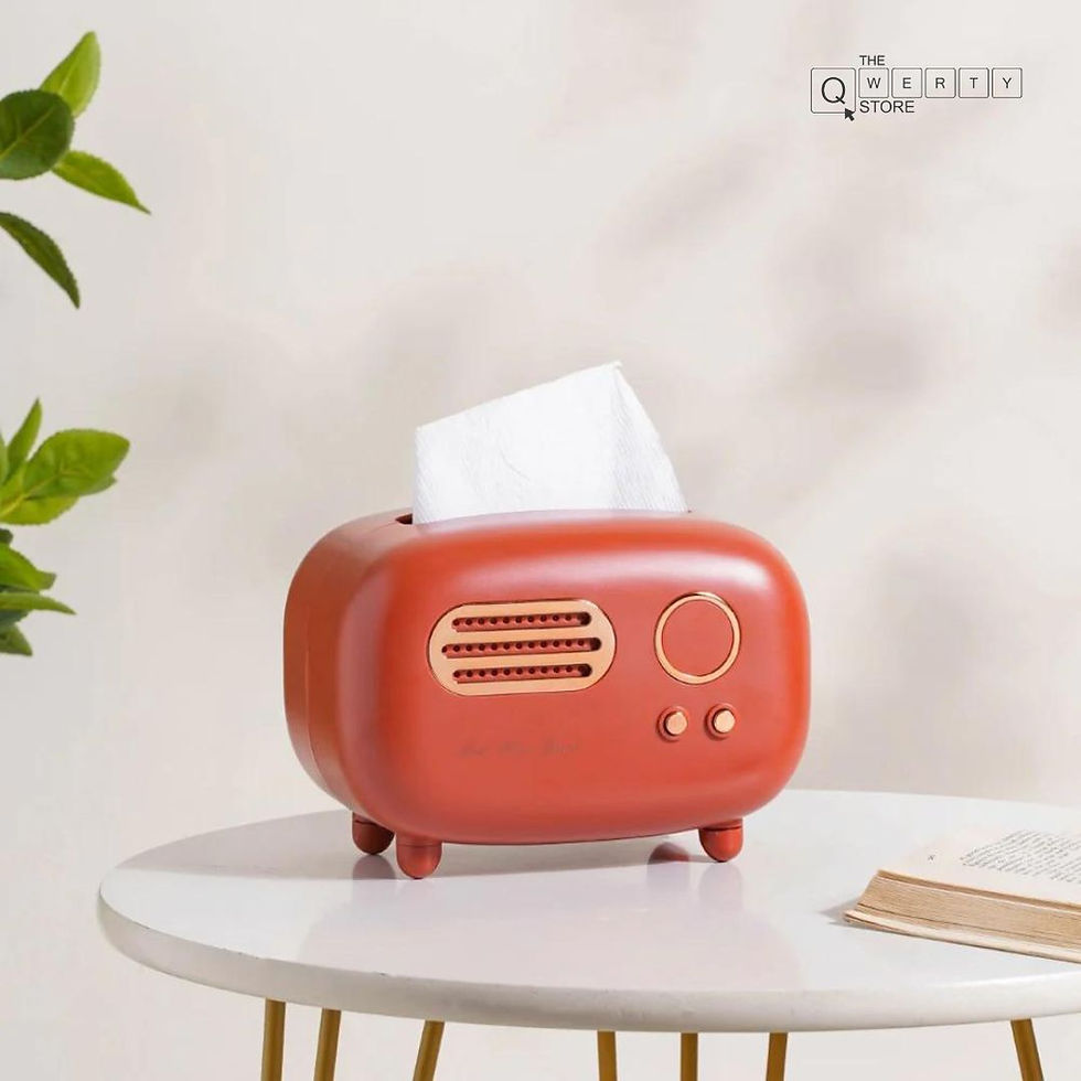 Thumbnail: Radio-shaped tissue box, red, tissue coming out. Sitting on a white table.
