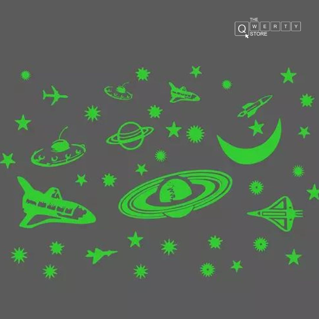Green glowing space stickers with planets and stars, The Qwerty Store logo.
