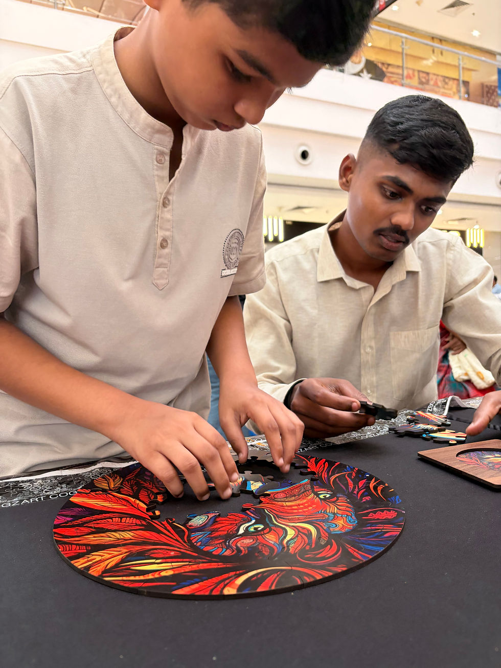 The image shows students assembling the vibrant Lion puzzle from Puzzle Subscription, highlighting collaborative student engagement activities through interactive play.
