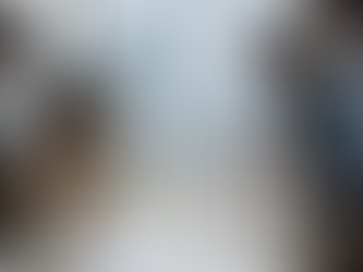 The Qwerty Academy team collaborating on AI design project with laptops, showcasing innovation, digital marketing, and real-world training skills