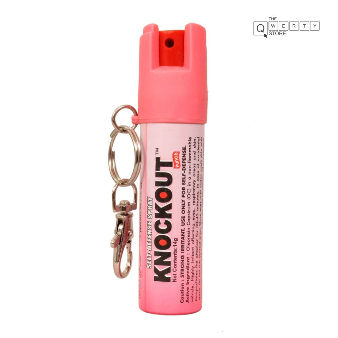 Pink Knockout pepper spray with keychain and visible text on white background.