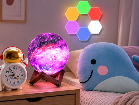The image shows cozy bedroom decor with an astronaut clock, galaxy lamp, colorful wall lights, and whale cushion from The QWERTY Store.