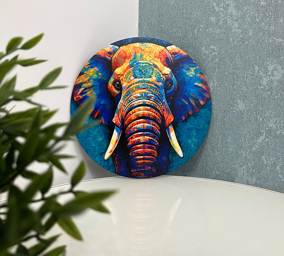 Colorful mosaic-style elephant Circular puzzle on a textured gray-and-white wall, with blurred green leaves in the foreground.