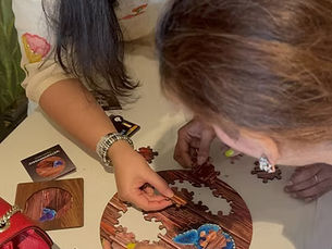 Friends solving a CircZles puzzle together, showing how Gifts for Puzzle Lovers can become a creative and memorable shared experience.