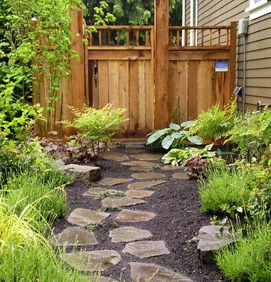 flagstone and fence with native flowers