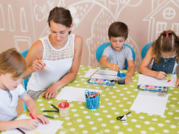 medium-shot-kids-painting-table (1).jpg