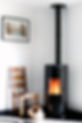 modern-black-stove-with-burning-flames-pellet-bag-living-room.jpg